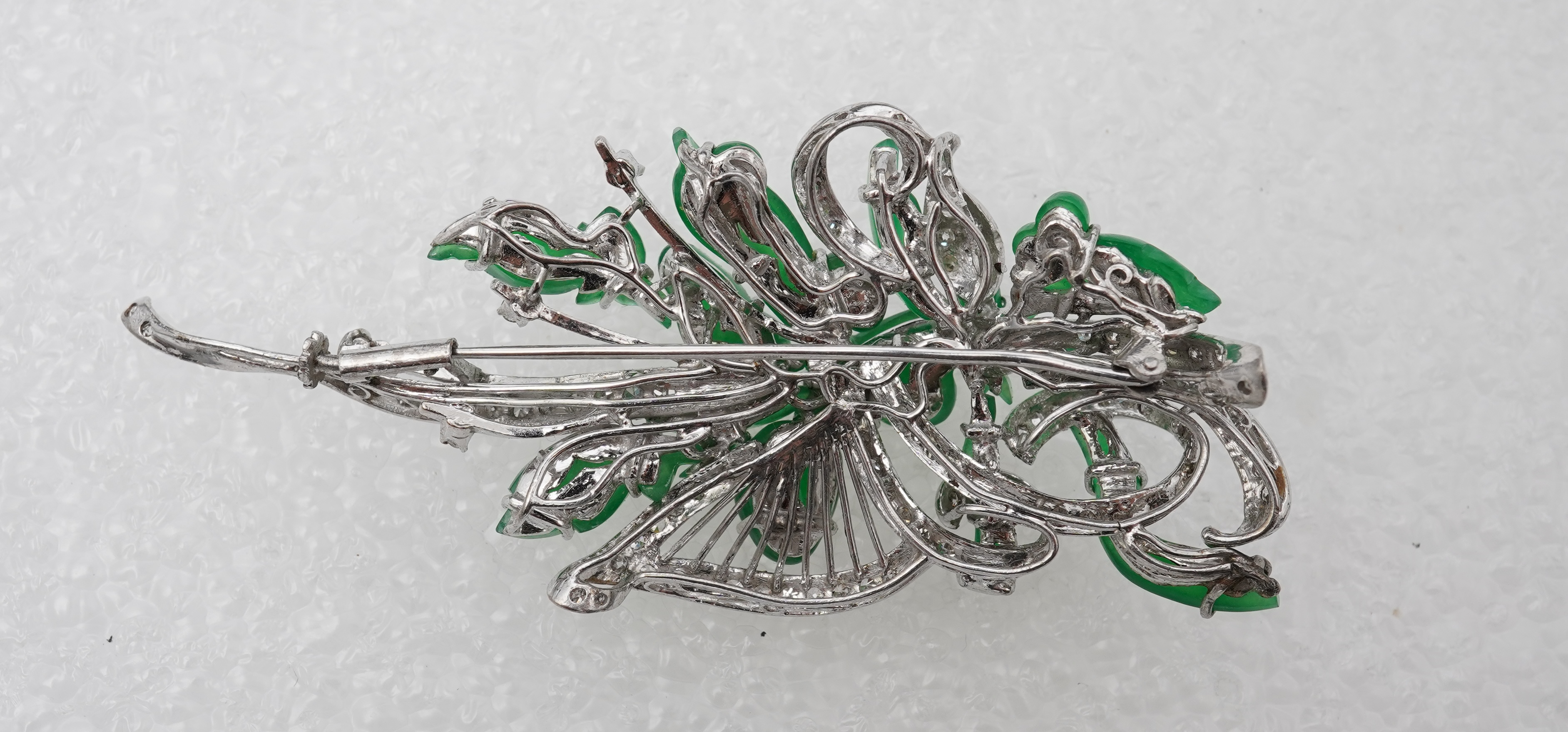 A fine jadeite and diamond brooch, 1960s